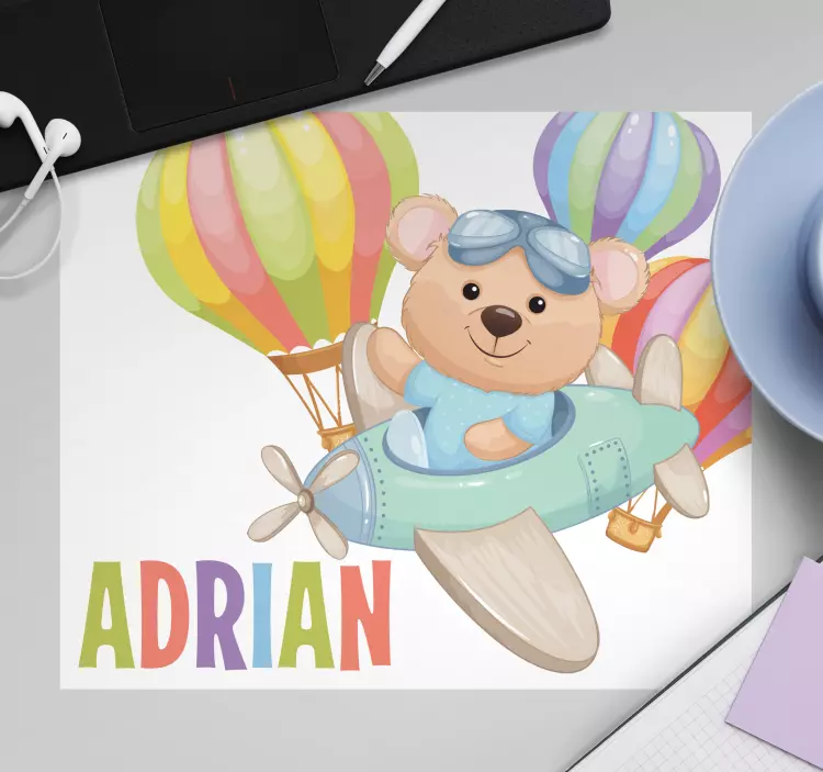 带着气球鼠标垫坐在飞机上 - TenStickers